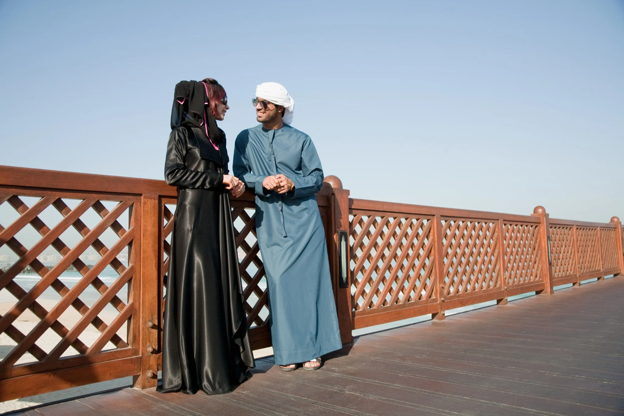 Couple enjoying an outdoor waterfront stop during a short city break