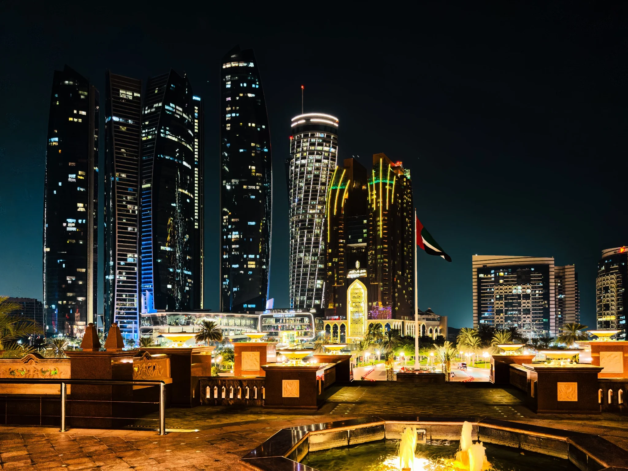 Abu Dhabi skyline illuminated at night during a 48 hour city break
