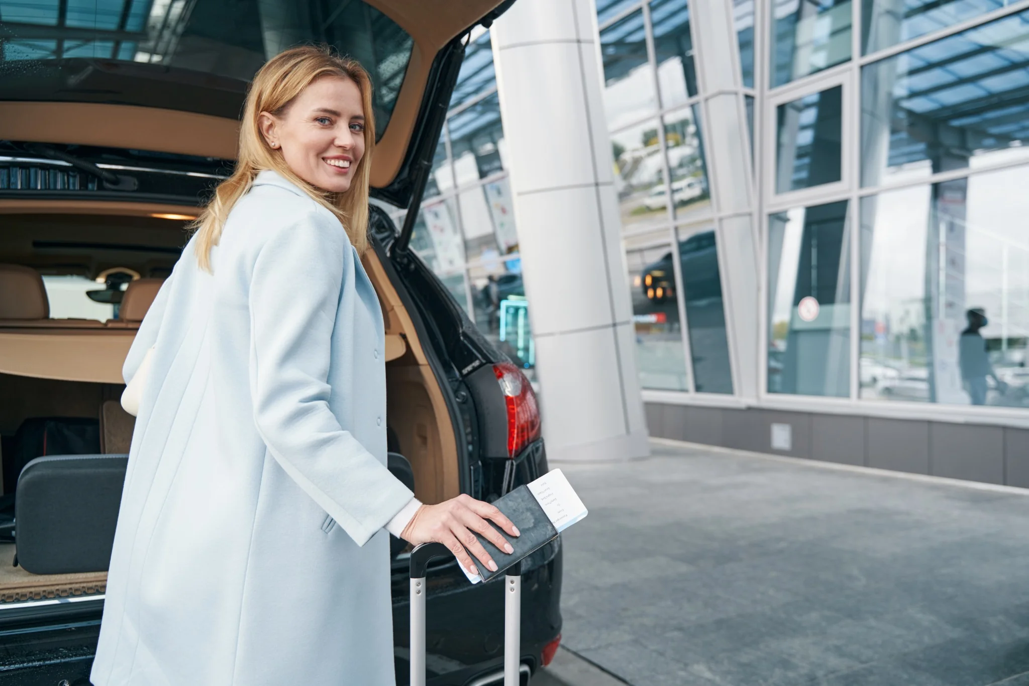 Passenger arriving for a private Abu Dhabi airport transfer