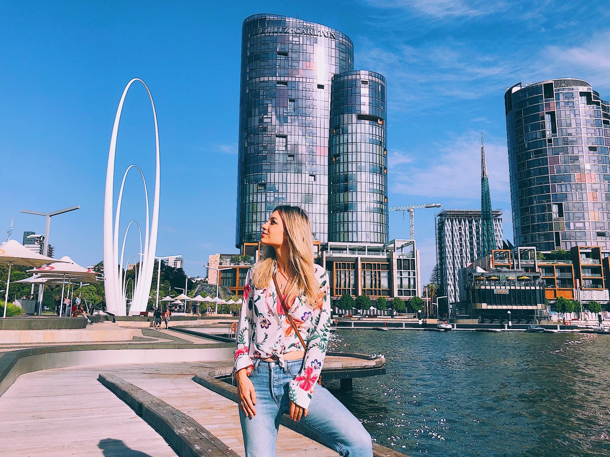 Travellers enjoying a city drive during an Abu Dhabi tour from Dubai