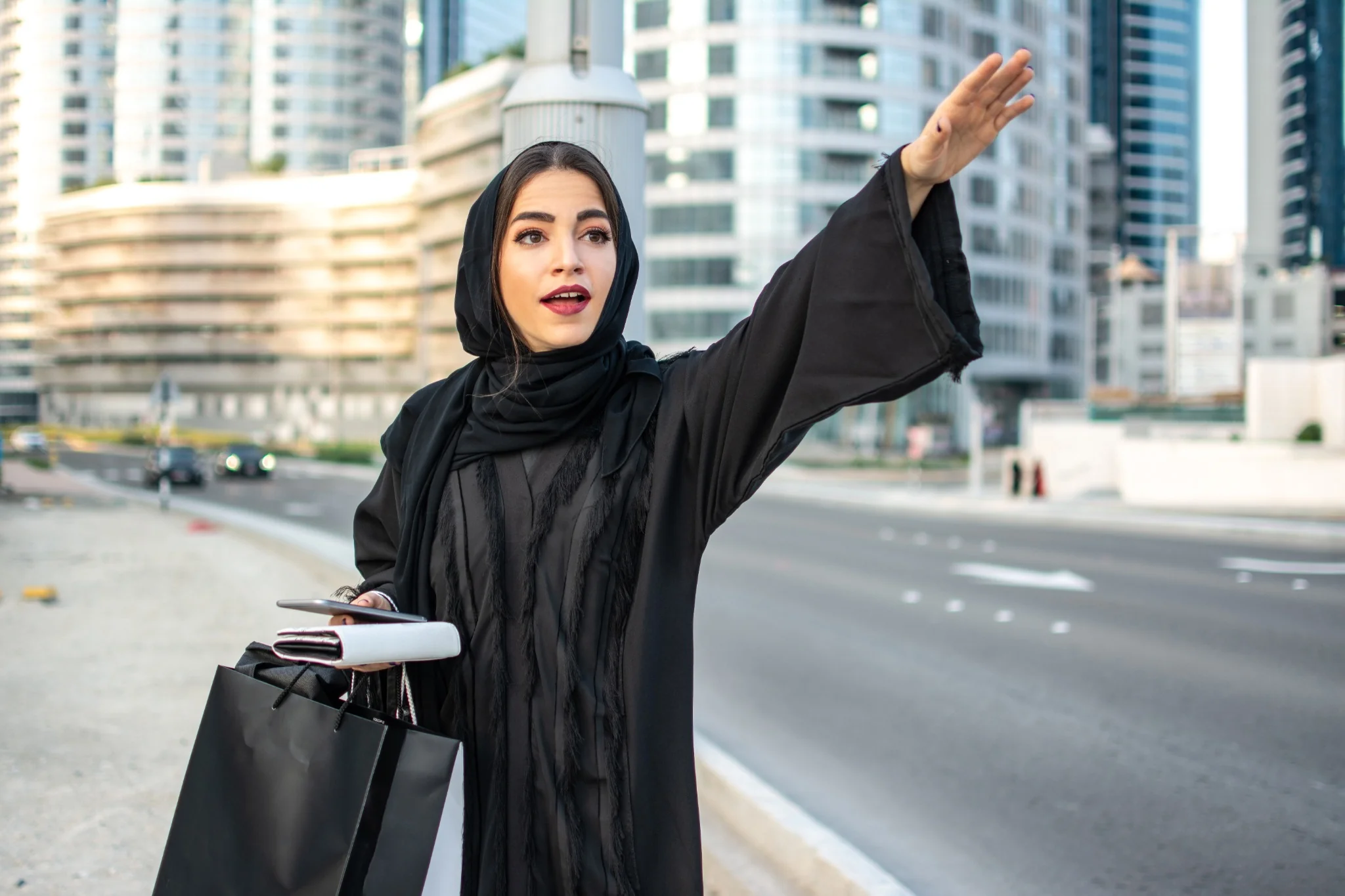 Business travellers using a private chauffeur transfer service