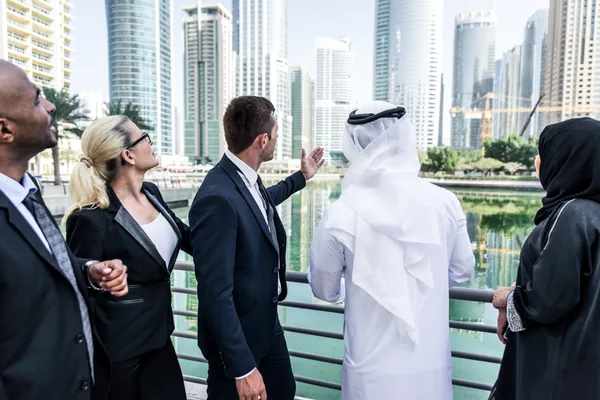 Dubai skyline and Burj Khalifa viewed from the waterfront during a business and investment introduction tour