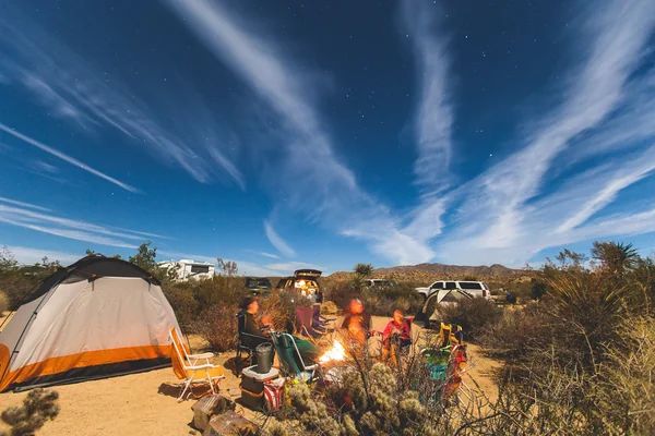 Private Liwa desert campsite under a star-filled sky during an overnight Empty Quarter camping experience