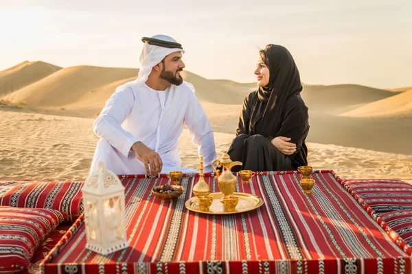 Guests preparing for quad biking in the desert during a private Abu Dhabi safari experience